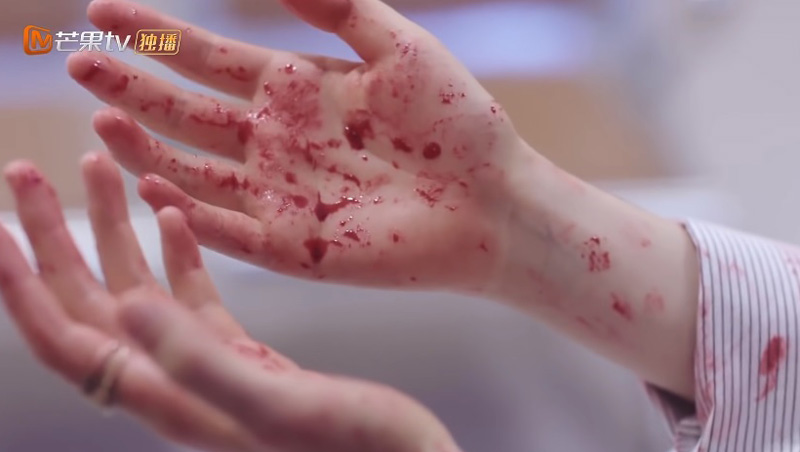 Li Qian's Hands with Blood